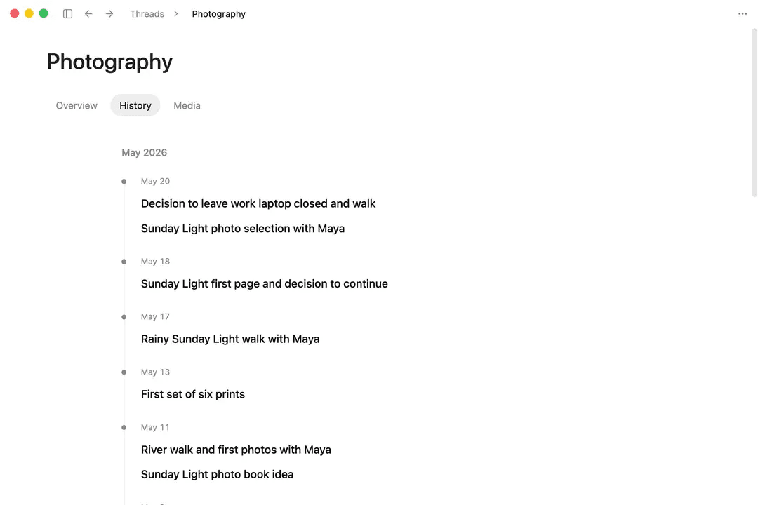 The Photography history follows May milestones, from first prints to making the Sunday Light photo book with Maya.